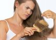 Frustrated woman looking on hair ends