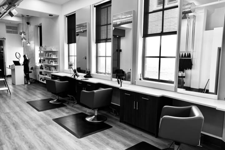 A monochrome image of a salon, showcasing the ambiance and style of a hair salon in black and white.